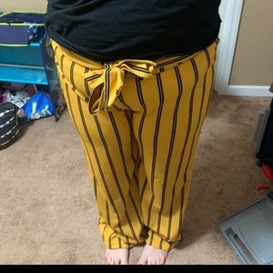 Like an angel  yellow with navy blue pinstripe pants